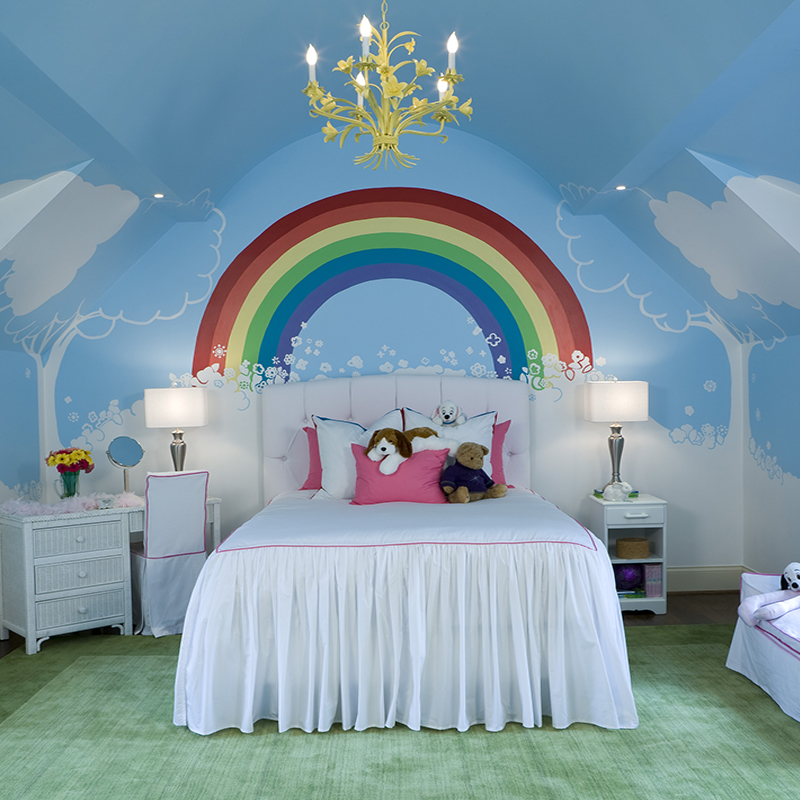 Kids room with rainbow mural