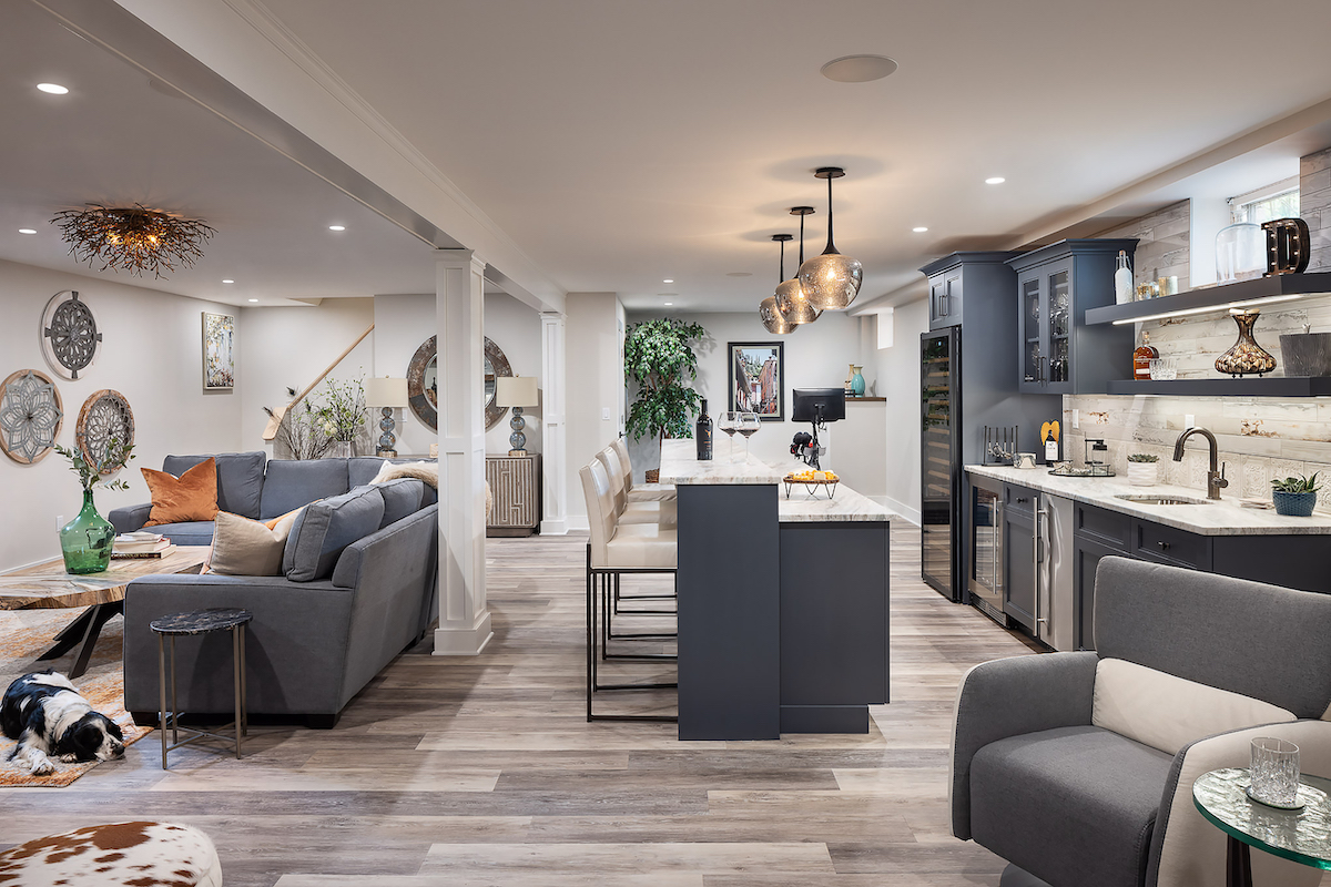 “What I love the most about the redesign is the clean, open feel and the functional spaces I gained,” says the owner of this renovated basement in Wyckoff. “Besides having a dedicated office, I can now also entertain in a whole different way.”